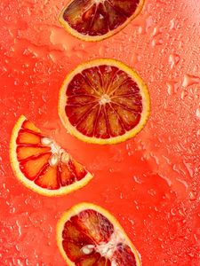 Preview wallpaper orange, citrus, wedges, fresh, red