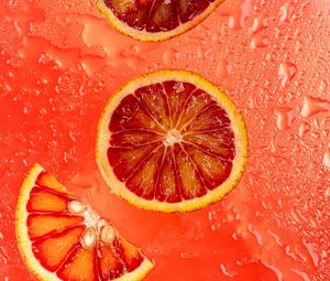 Preview wallpaper orange, citrus, wedges, fresh, red