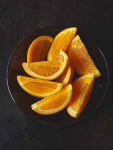 Preview wallpaper orange, fruit, slices, citrus, dish