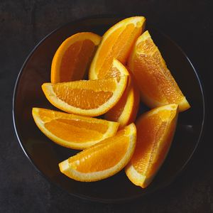 Preview wallpaper orange, fruit, slices, citrus, dish