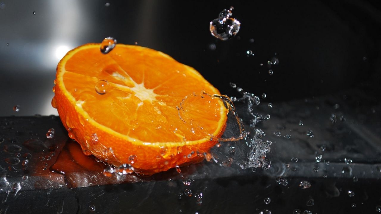 Wallpaper orange, segment, splashes, water