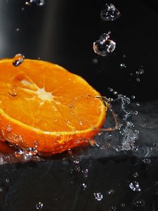 Preview wallpaper orange, segment, splashes, water