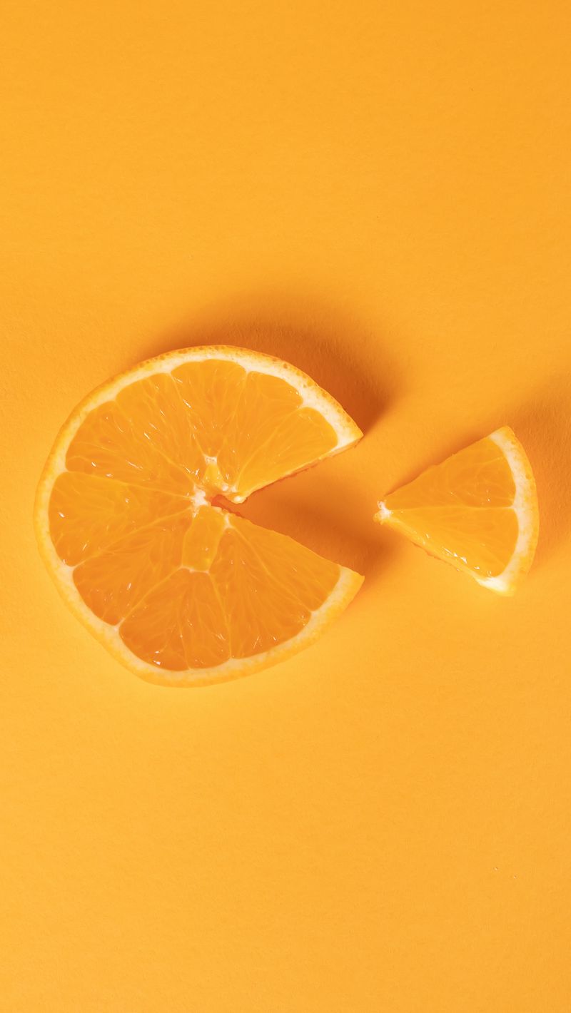 800x1420 Wallpaper orange, slice, citrus