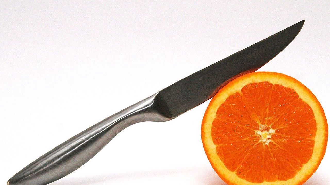 Wallpaper orange, slice, knife