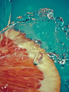 Preview wallpaper orange, slice, spray, water, fruit