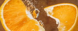 Preview wallpaper orange, slices, bubbles, water