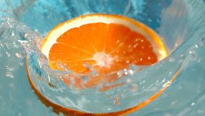 Preview wallpaper orange, water, splashes