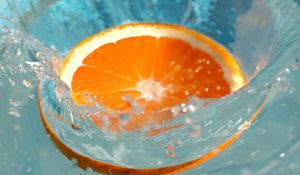 Preview wallpaper orange, water, splashes