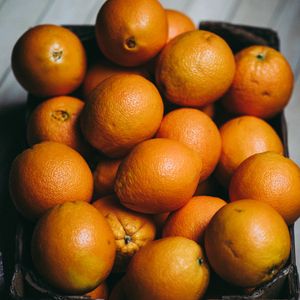 Preview wallpaper oranges, citrus fruits, ripe, box