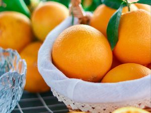Preview wallpaper oranges, fruits, citrus, basket