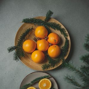 Preview wallpaper oranges, fruits, citrus, branches, spices