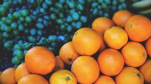 Preview wallpaper oranges, grapes, fruit