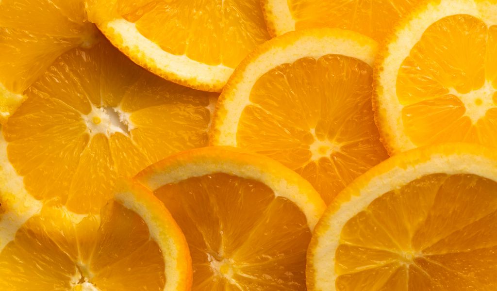 1024x600 Wallpaper oranges, slices, citrus, fruit, orange, yellow