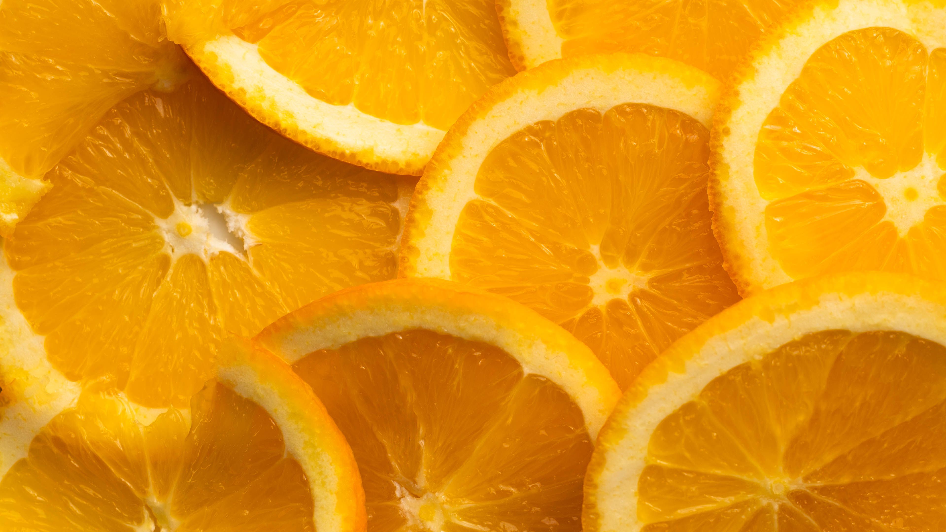 3840x2160 Wallpaper oranges, slices, citrus, fruit, orange, yellow