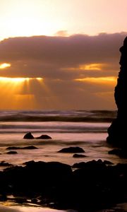 Preview wallpaper oregon, stones, blocks, sea, waves, decline, sun rays, clouds