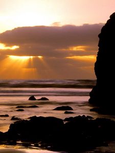 Preview wallpaper oregon, stones, blocks, sea, waves, decline, sun rays, clouds