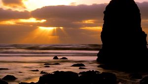 Preview wallpaper oregon, stones, blocks, sea, waves, decline, sun rays, clouds