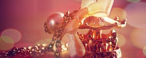 Preview wallpaper ornaments, gold ribbon, glare