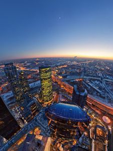 Preview wallpaper oscow city, evening, lights, moon, horizon