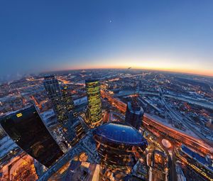 Preview wallpaper oscow city, evening, lights, moon, horizon