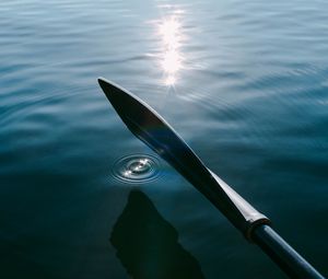 Preview wallpaper paddle, boat, ripples, glare, water