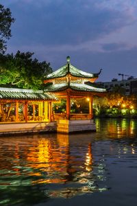 Preview wallpaper pagoda, building, backlight, trees, lake, twilight