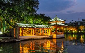 Preview wallpaper pagoda, building, backlight, trees, lake, twilight