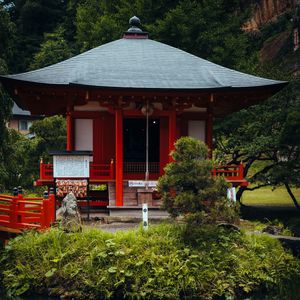 Preview wallpaper pagoda, building, pond, grass, japan, landscape