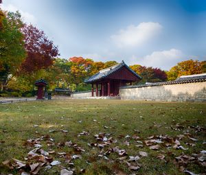 Preview wallpaper pagoda, temple, architecture, field, fence, trees, landscape