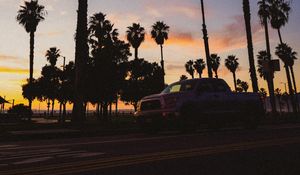 Preview wallpaper palm trees, dark, road, car, dusk