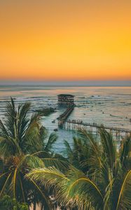 Preview wallpaper palm trees, ocean, sunset, pier, building