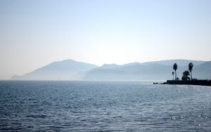Preview wallpaper palm trees, silhouettes, mountains, sea, nature