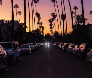 Preview wallpaper palm trees, twilight, street, road, cars