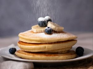 Preview wallpaper pancake, blueberries, banana, icing sugar, dessert