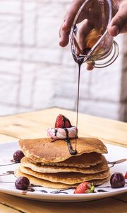 Preview wallpaper pancakes, dessert, fruit, chocolate, hand