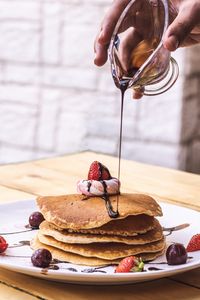 Preview wallpaper pancakes, dessert, fruit, chocolate, hand