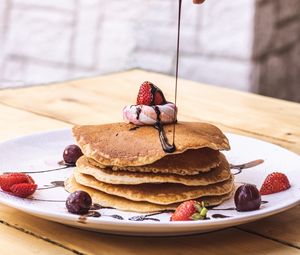 Preview wallpaper pancakes, dessert, fruit, chocolate, hand