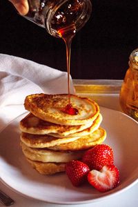 Preview wallpaper pancakes, strawberries, berries, honey, watering, breakfast, dessert