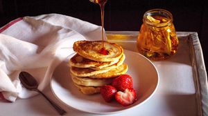 Preview wallpaper pancakes, strawberries, berries, honey, watering, breakfast, dessert