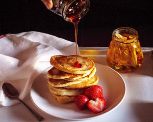 Preview wallpaper pancakes, strawberries, berries, honey, watering, breakfast, dessert