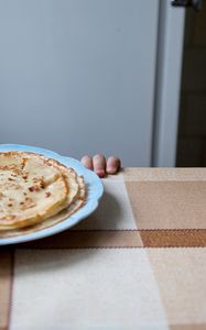 Preview wallpaper pancakes, table, fingers