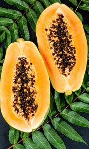 Preview wallpaper papaya, fruit, exotic, leaves