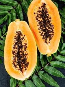 Preview wallpaper papaya, fruit, exotic, leaves