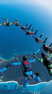 Preview wallpaper parachute jump, synchronously, beautifully