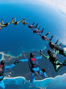 Preview wallpaper parachute jump, synchronously, beautifully