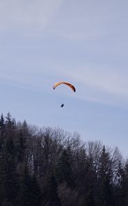 Preview wallpaper parachute, parachutist, trees, sky