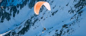 Preview wallpaper parachutist, parachute, mountains, snow, extreme