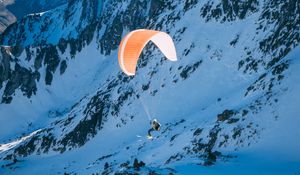 Preview wallpaper parachutist, parachute, mountains, snow, extreme