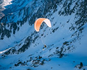 Preview wallpaper parachutist, parachute, mountains, snow, extreme