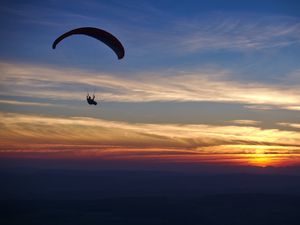 Preview wallpaper parachutist, parachute, silhouette, sunset, sky, dark